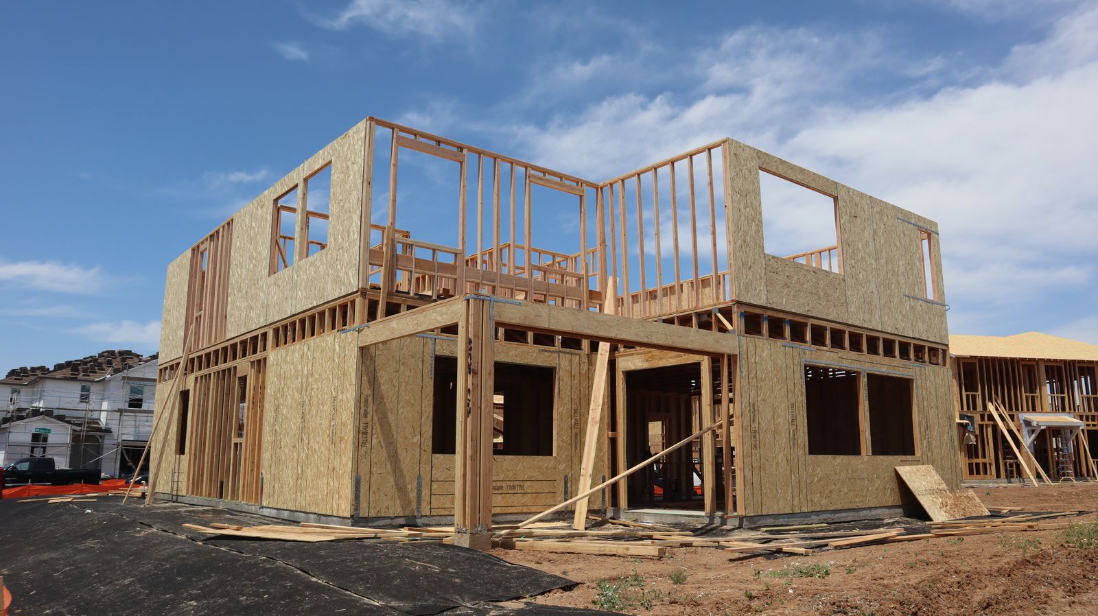 Real house under construction with exposed timber framing
